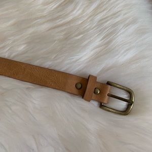 Brown embroidered belt.